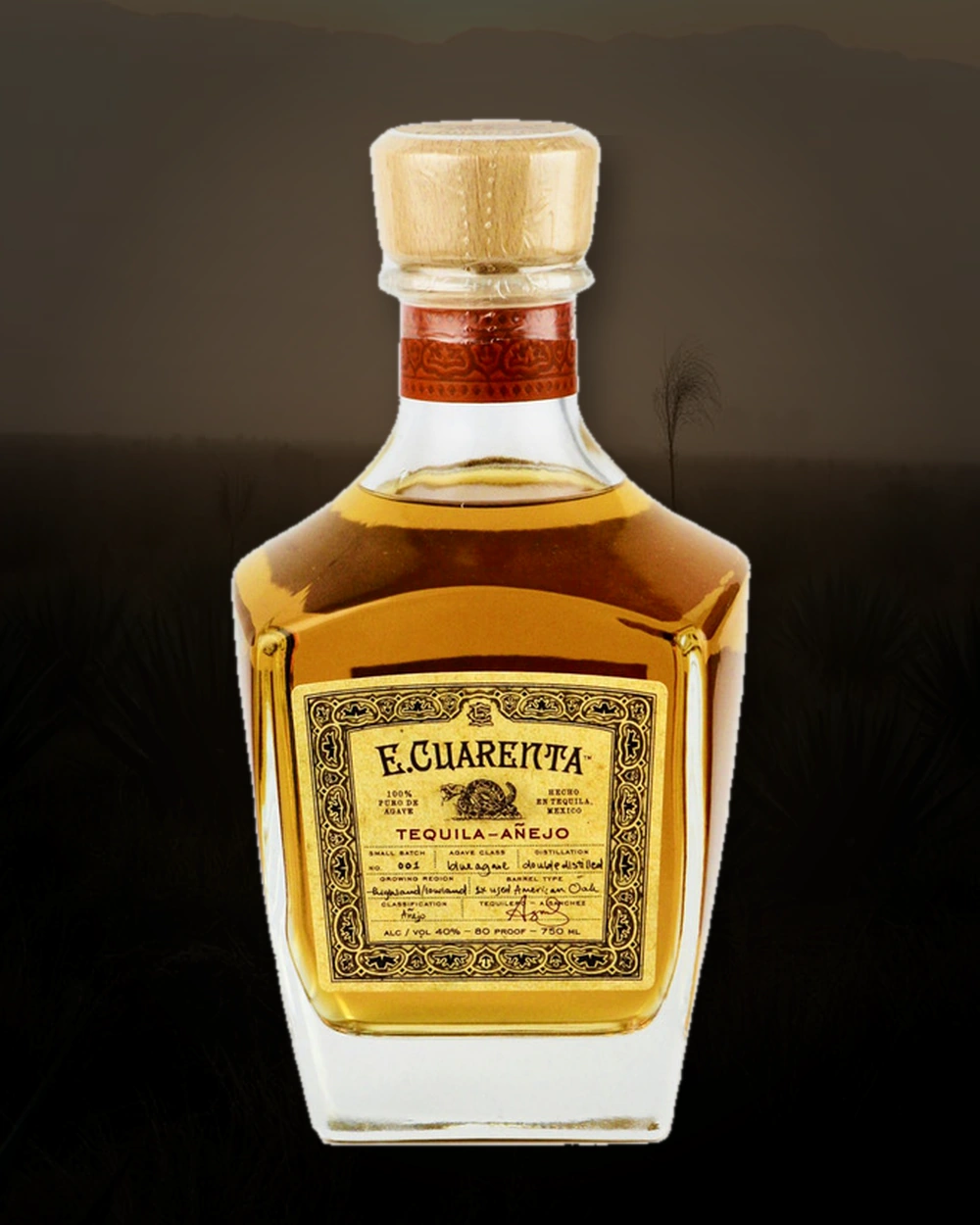 E. Cuarenta Tequila Añejo bottle